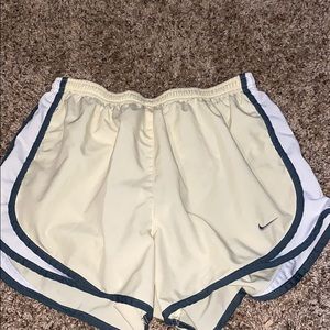 Nike yellow athletic shorts